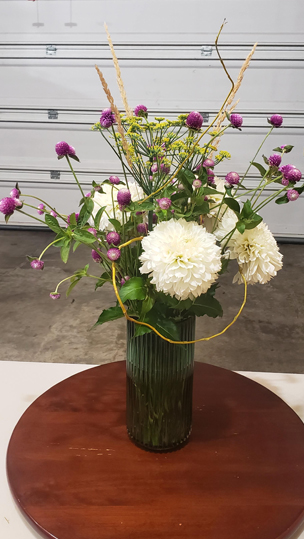 Leucadendron, Bird of Paradise, Yellow Roses, & Aspidistra